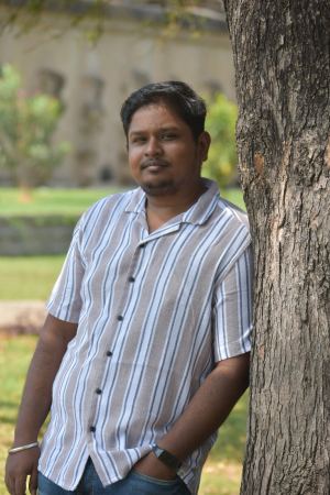 M DINESH