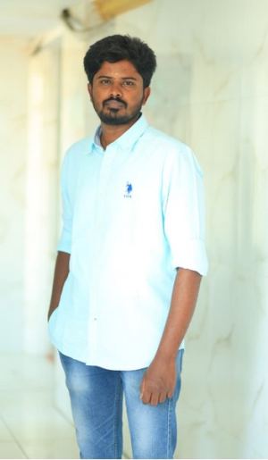 E.அசோக்